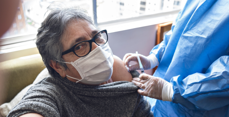 person receiving a covid vaccination