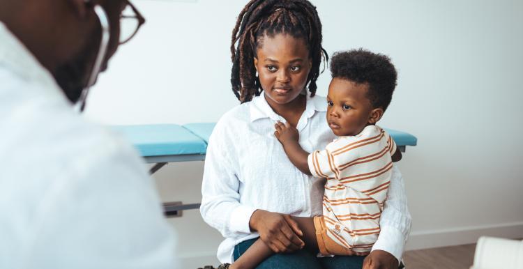 Woman and child at a doctors appointment