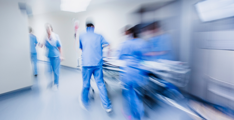 Blurred emergency scene in a hospital.