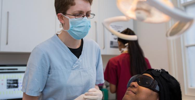 Dentist with patient