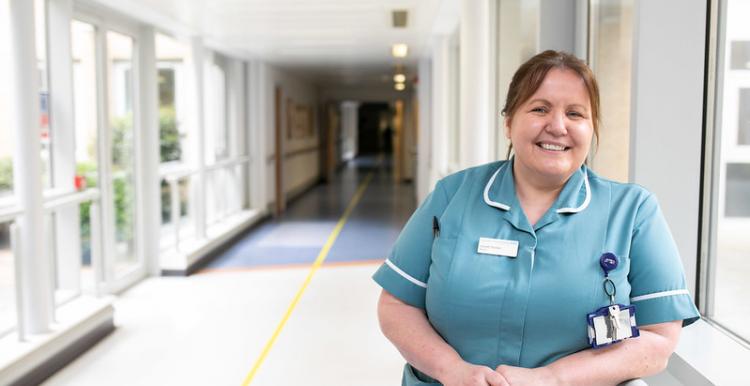 Female carer in hospital environment 