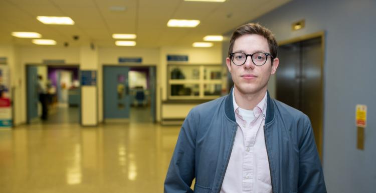 Young man in hospital looking directly at the camera