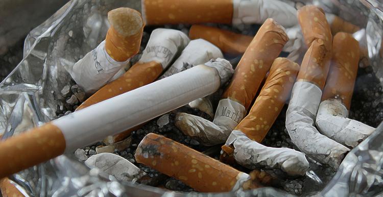 An ashtray full of cigarettes 