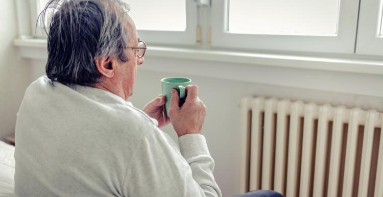 man with cup