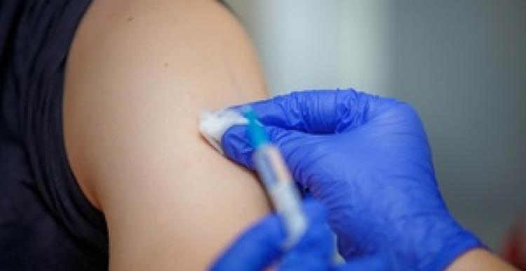arm-vaccine-syringe-close-up.jpg