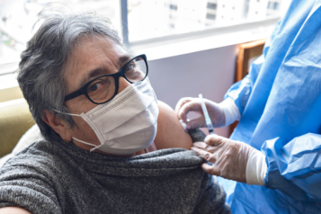 person receiving a covid vaccination