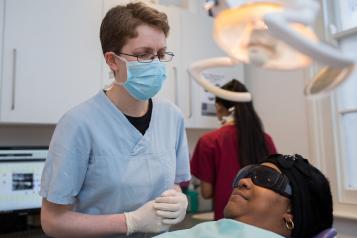 Dentist with patient 