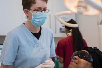 Dentist with patient 