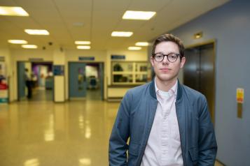 Young man in hospital looking directly at the camera