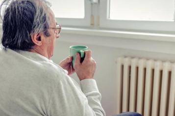 man with cup